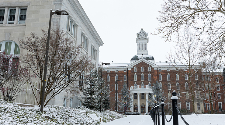 Old Main with snow on campus