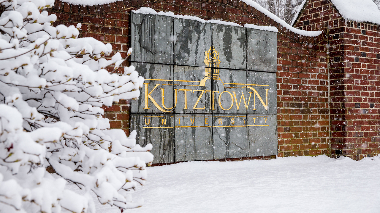 Kutztown University sign covered in snow