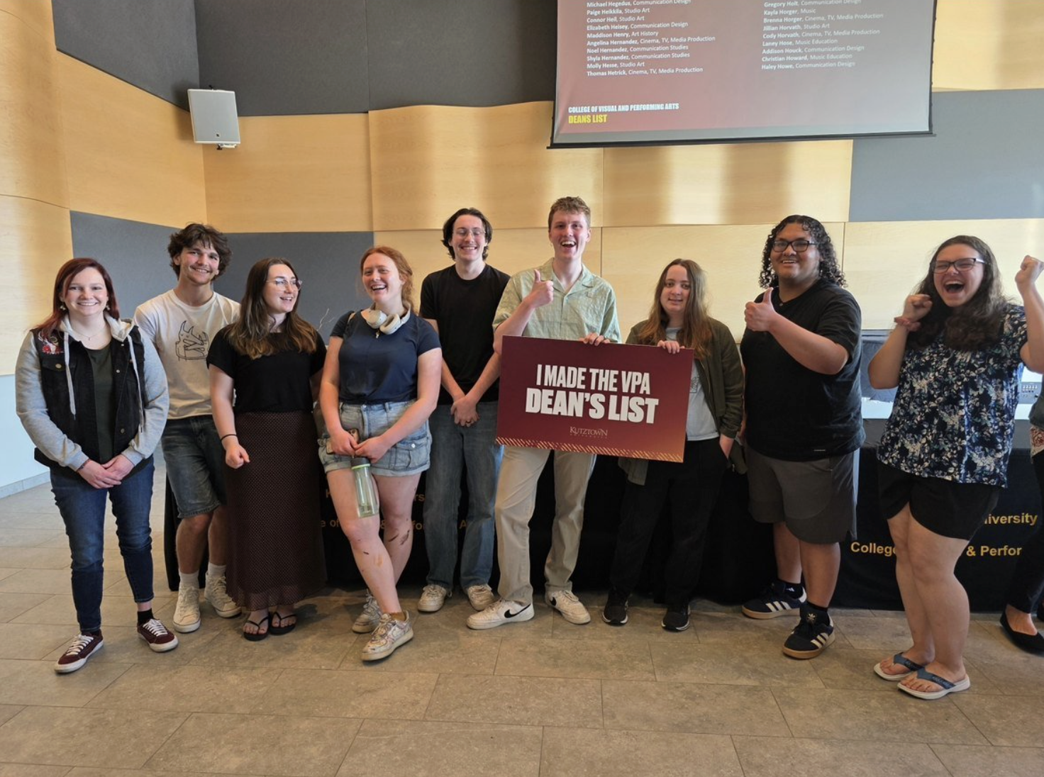 Photo of students with a sign that reads: I made the VPA Dean's List
