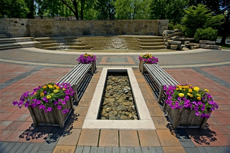 Distance shot of fountain and benches