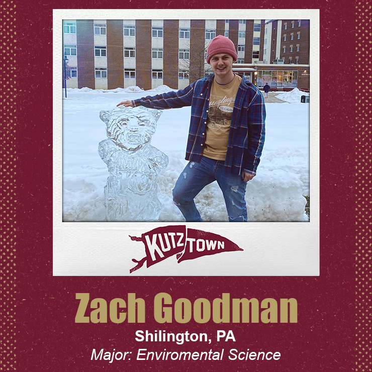 Zach Goodman smiling and standing next to an ice sculpture of a roaring bear, his hand on its head, with his name and major, Environmental Science, listed below the picture  