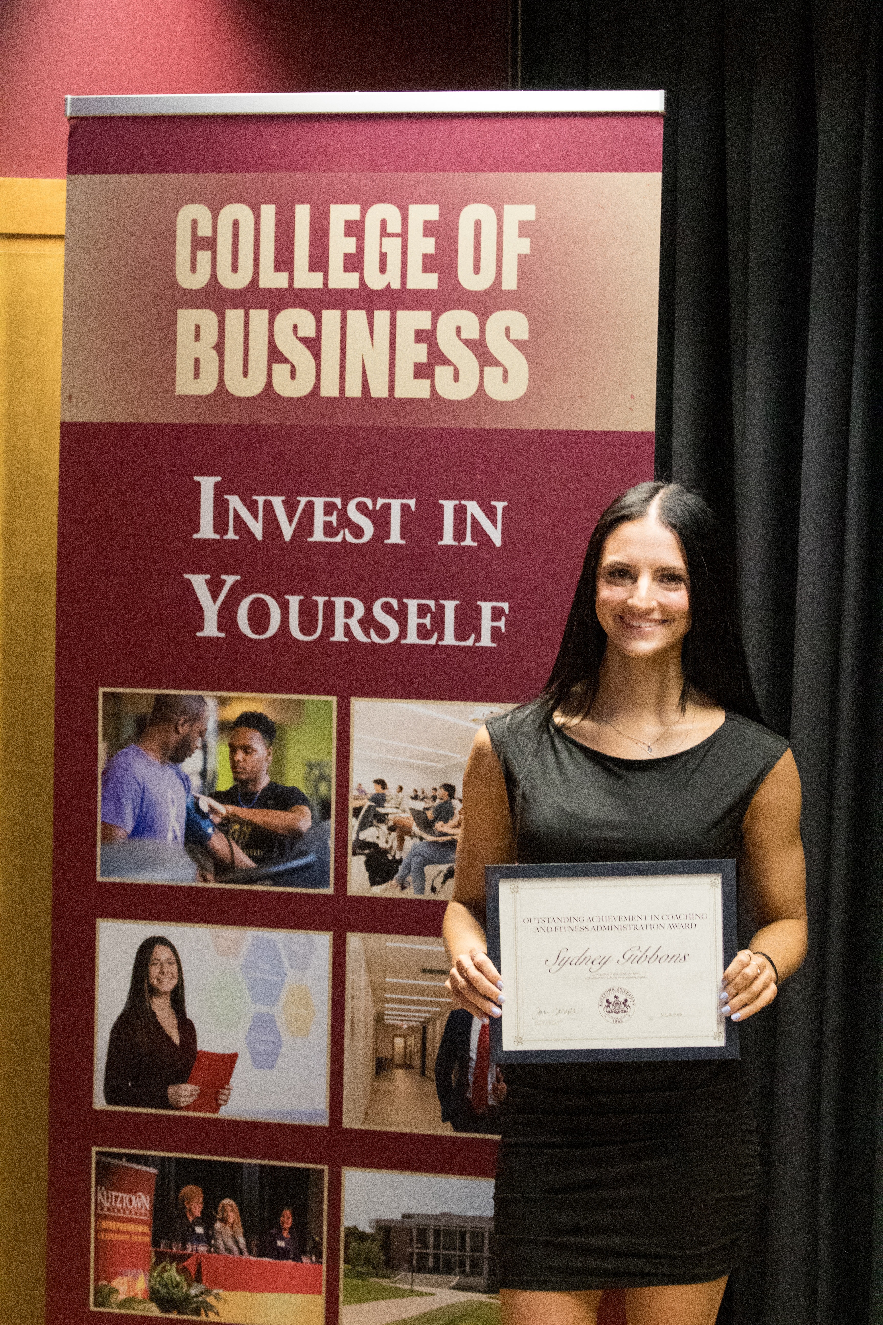 Sydney Gibbons with award