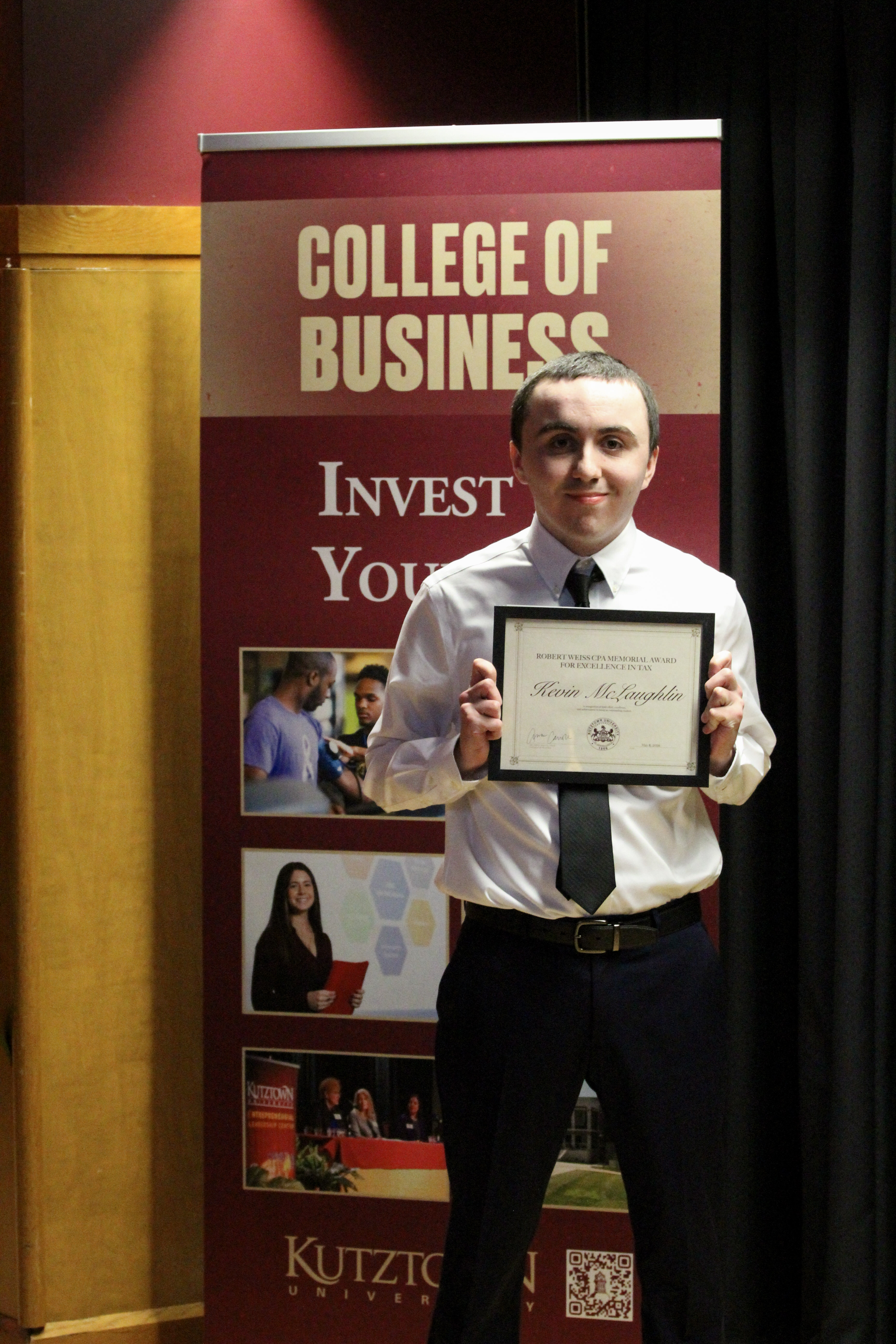 Kevin McLaughlin with award
