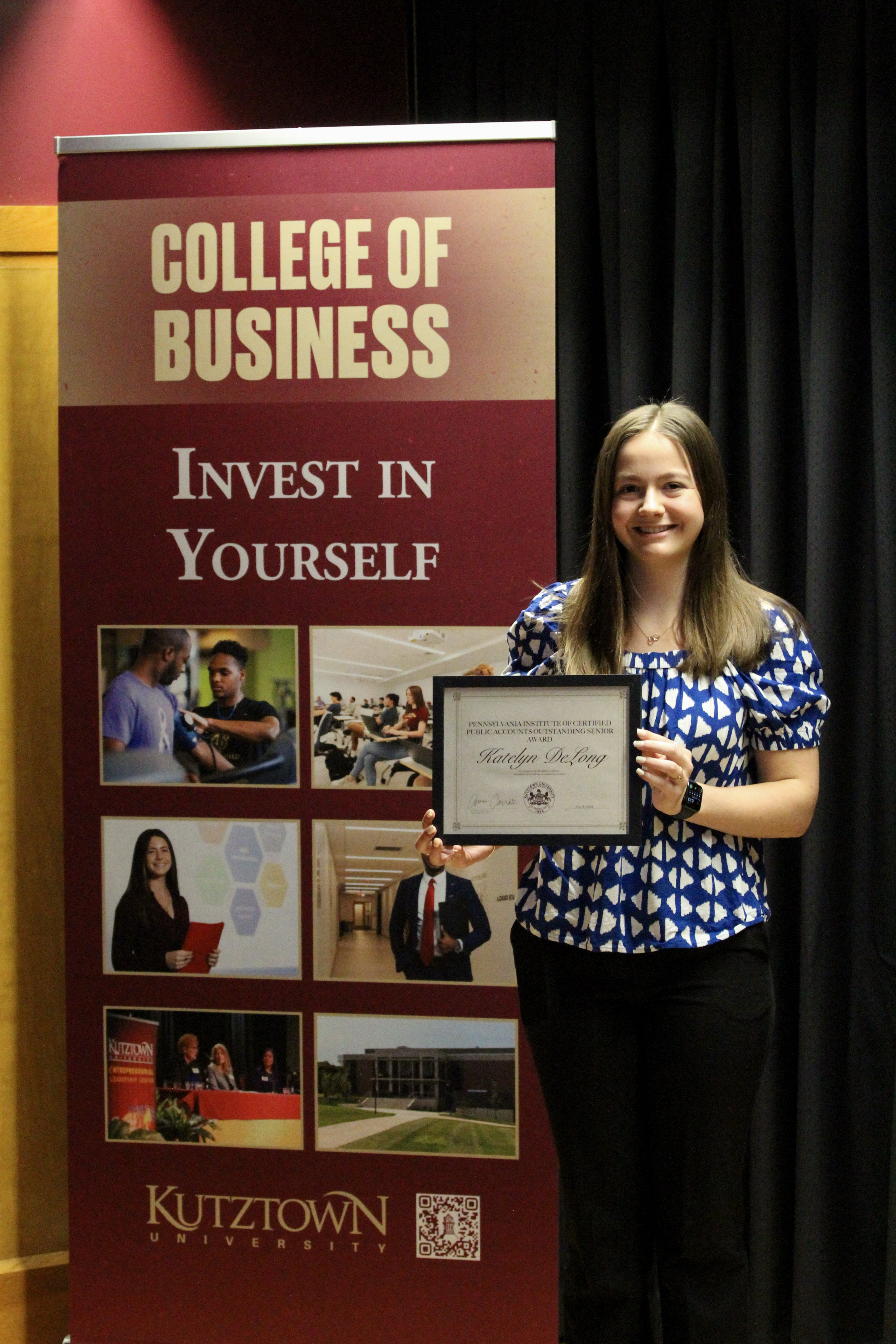 Katelyn DeLong with award