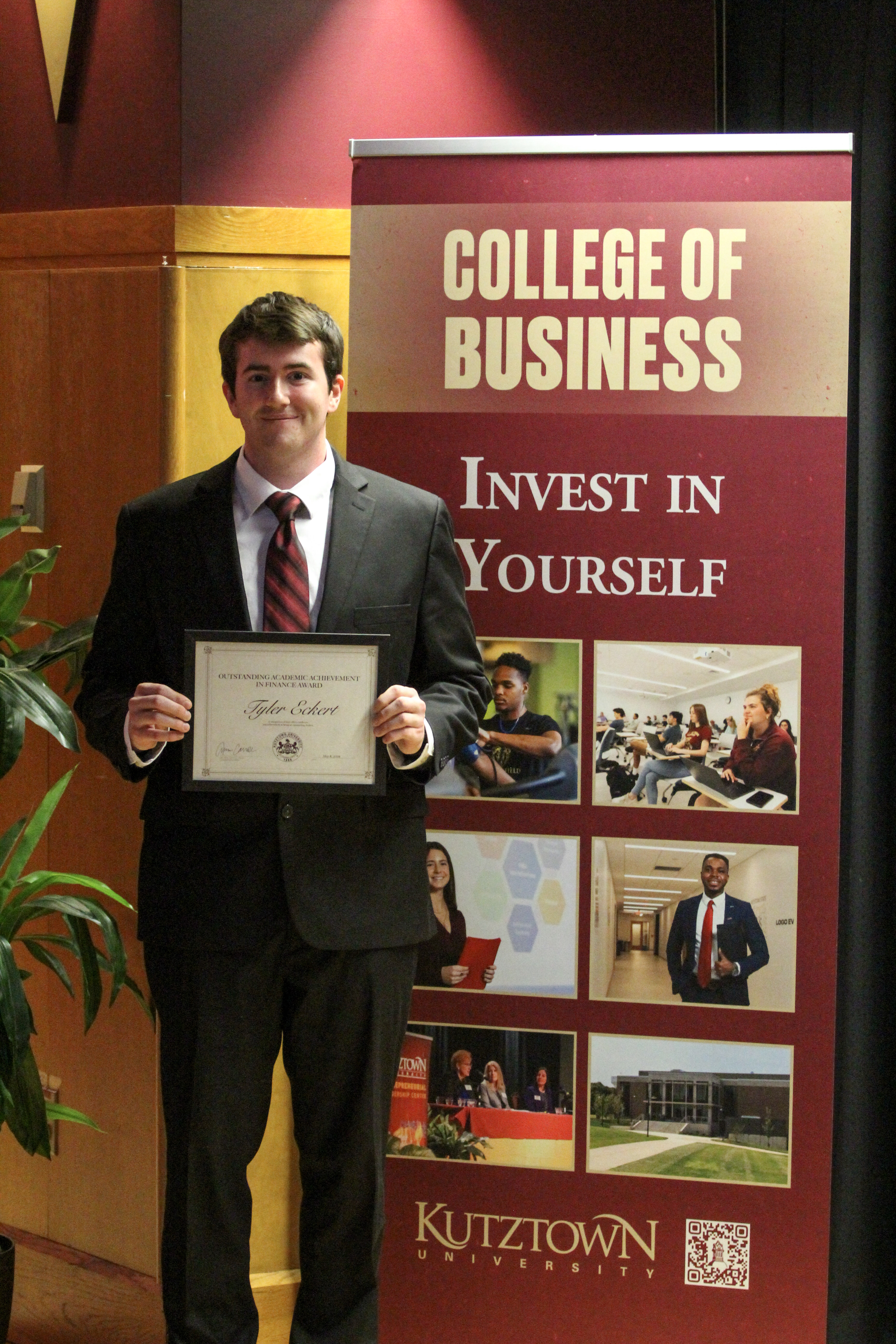 Tyler Eckert with award