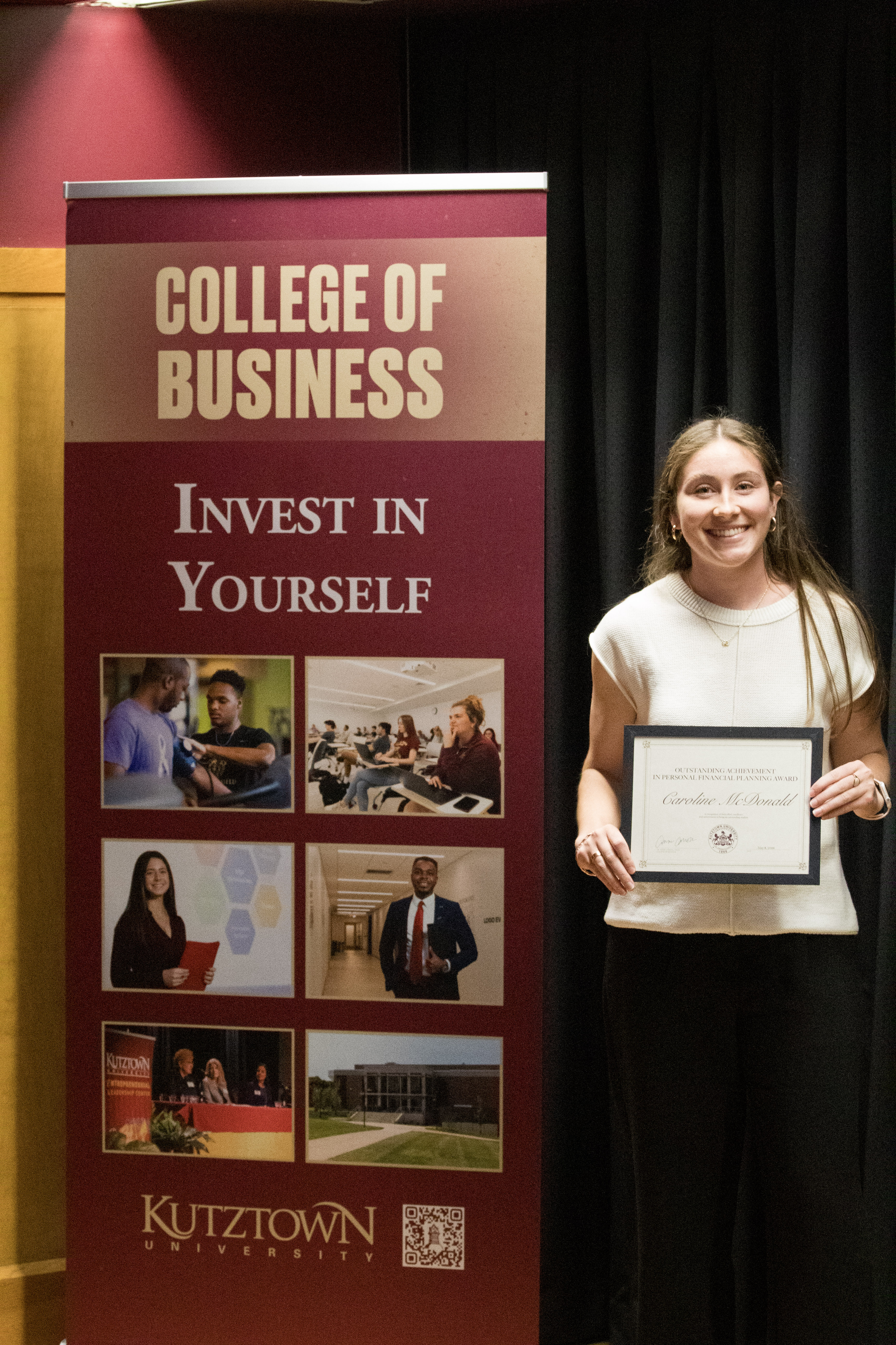 Caroline McDonald with award