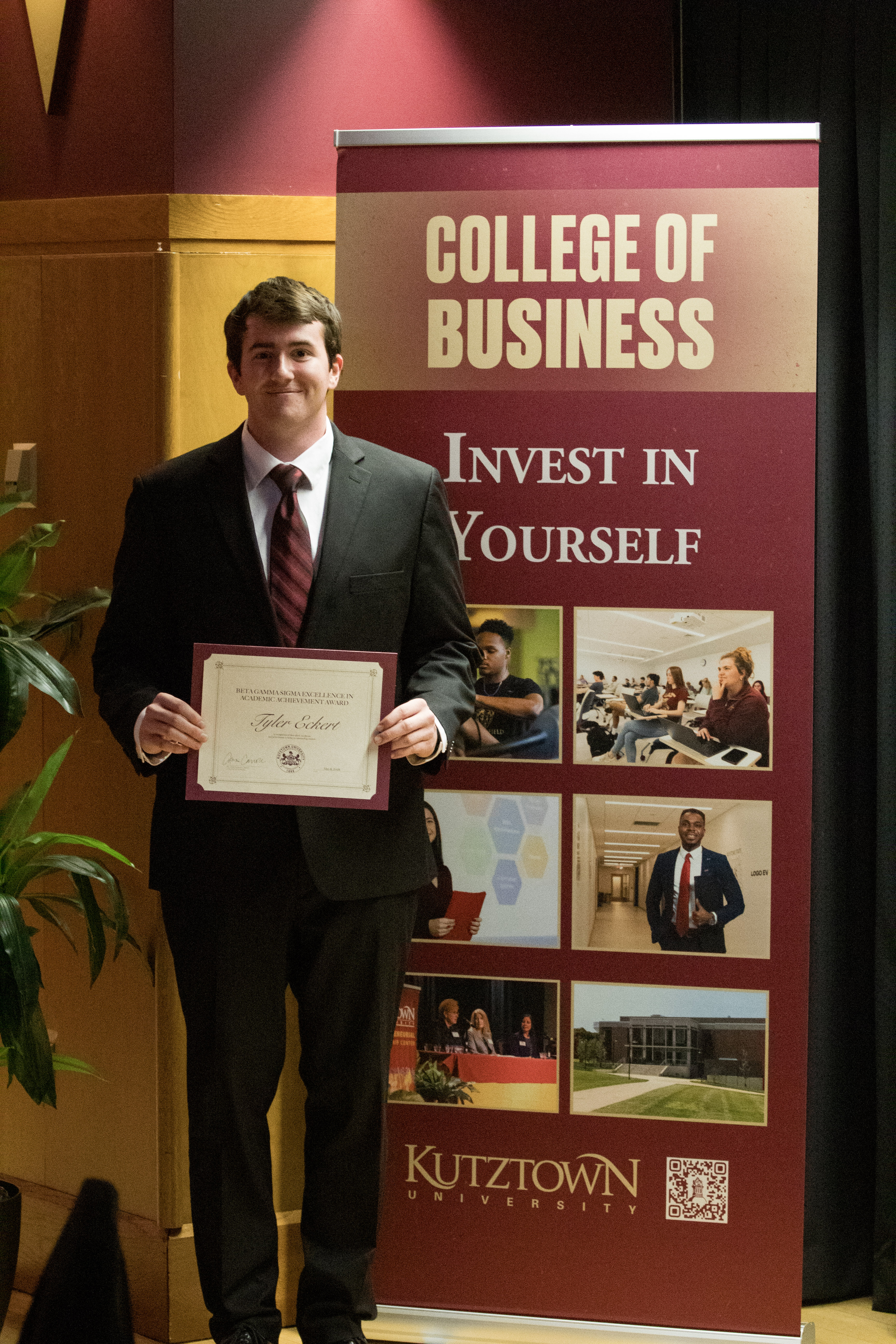 Tyler Eckert with award