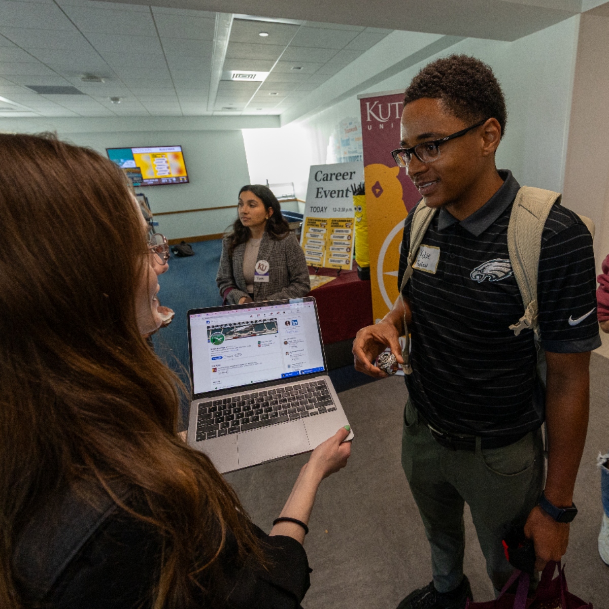 Students, Faculty members and industry professionals networking in the de Francesco lobby