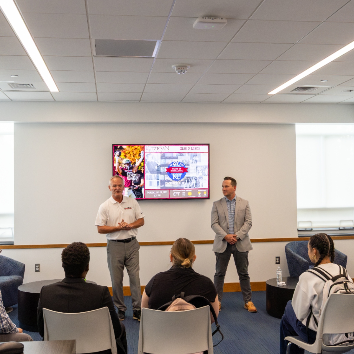 industry professionals networking with students