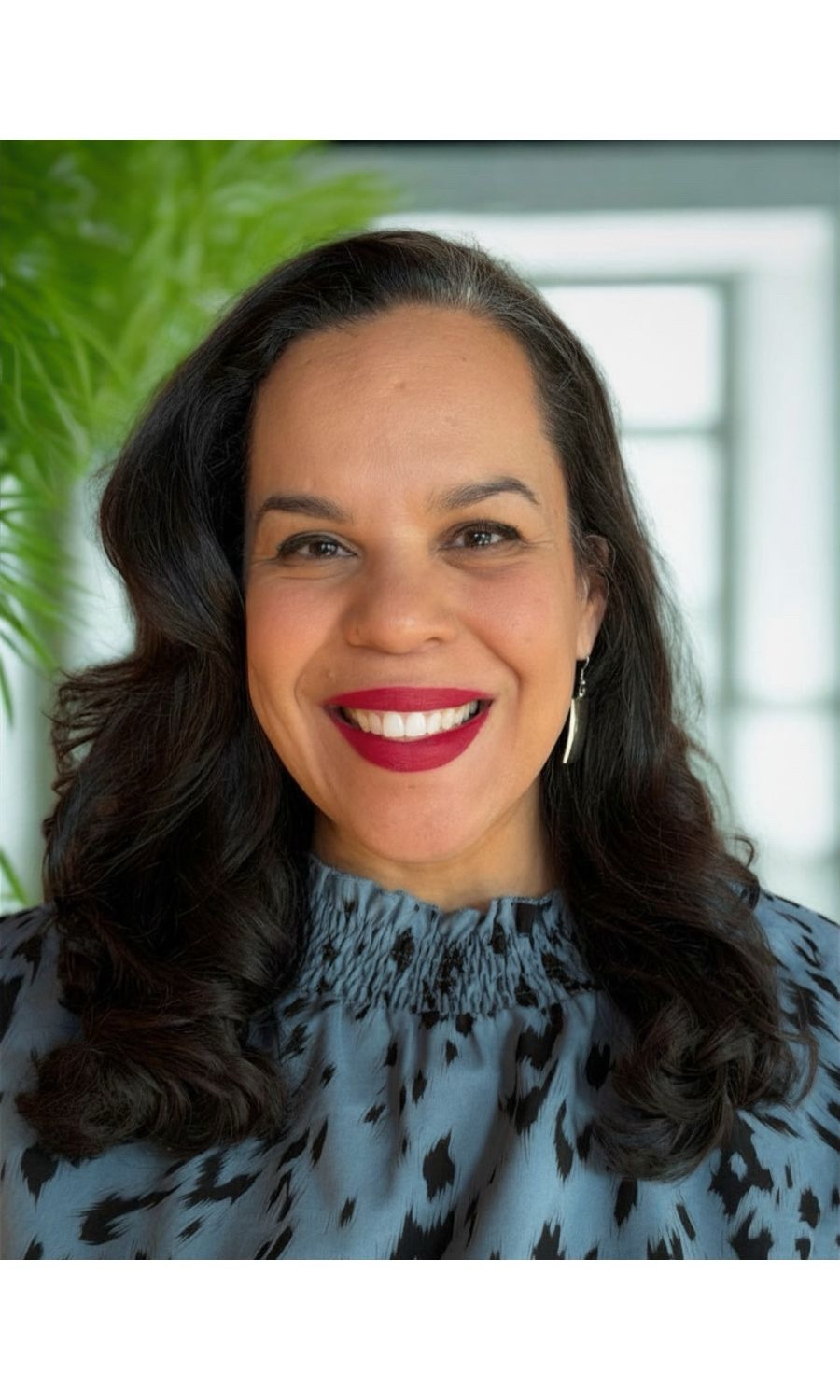 Dr. Melinda Quinones-Arias, winner of 2025 Keeper of the Flame Award