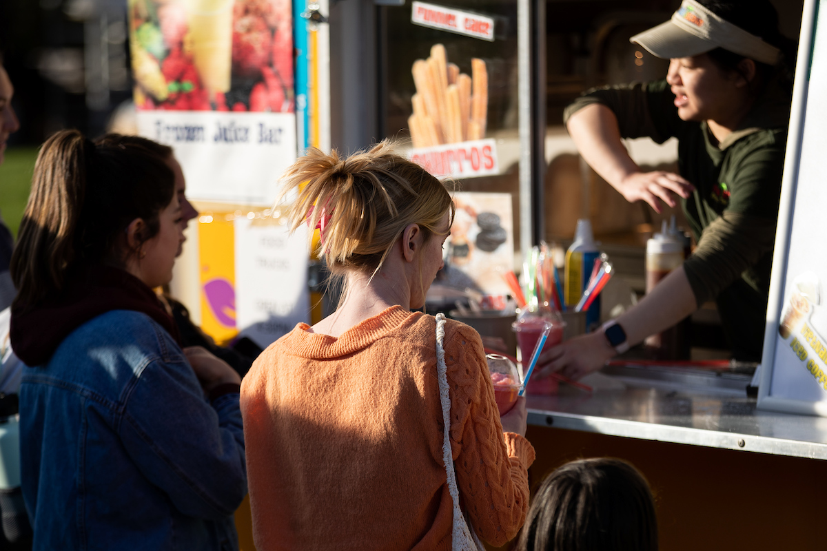 Students ordering from food truck
