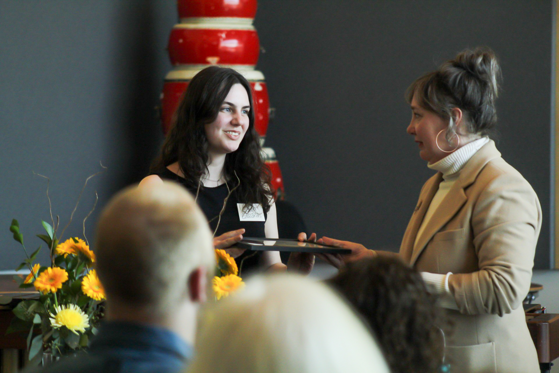 Photo of Gabby Edwards receiving award