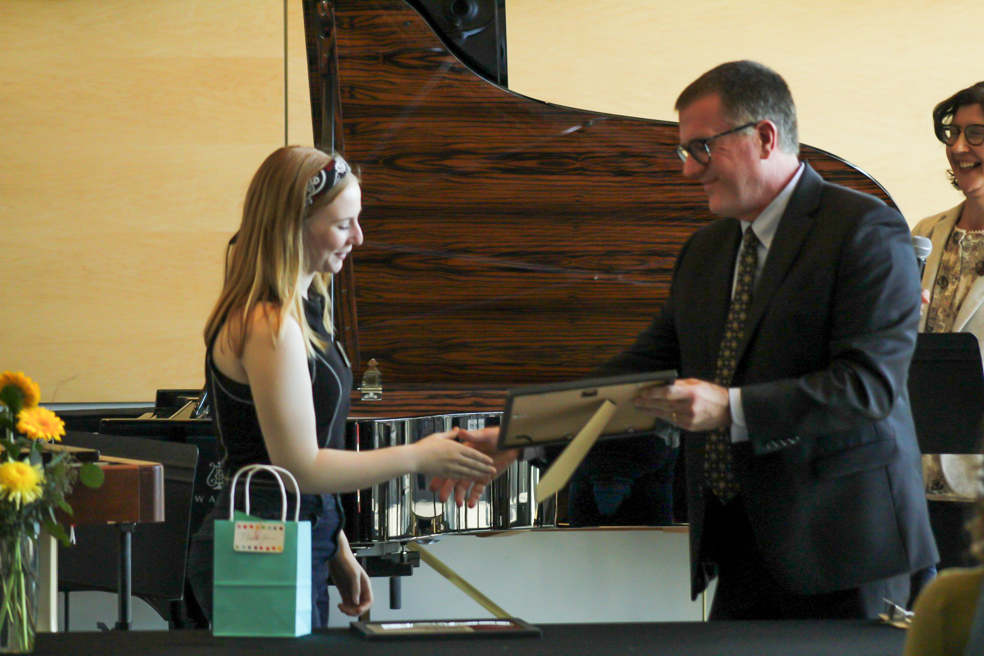 Photo of Sarah Love receiving award