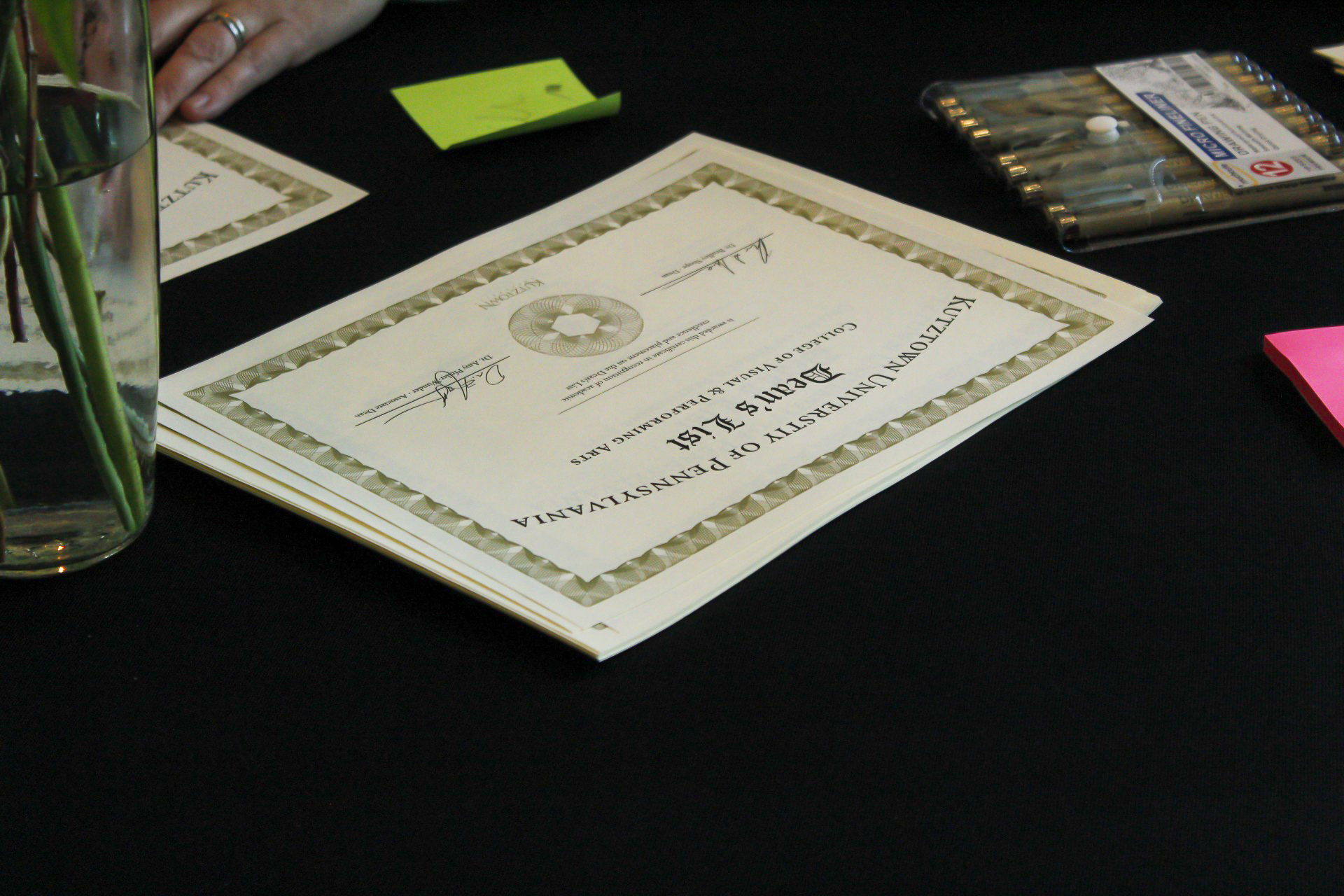 Student holds up sign reading: I made the VPA Dean's List