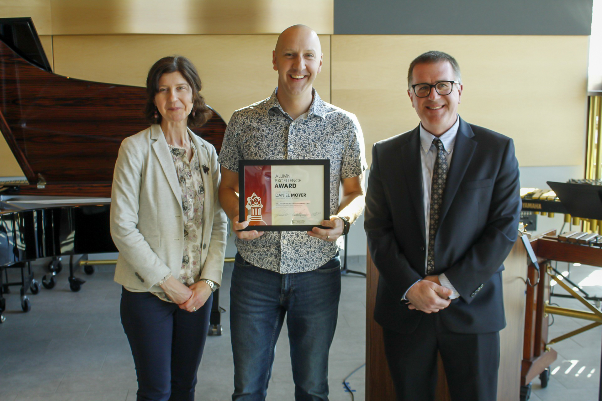 Group photo of three individuals