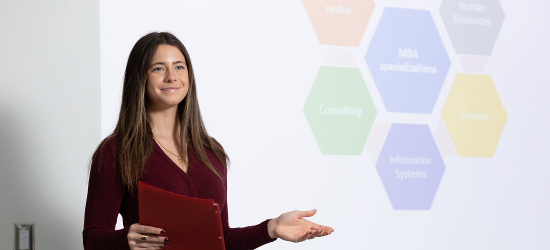 Woman teaching in front of projector