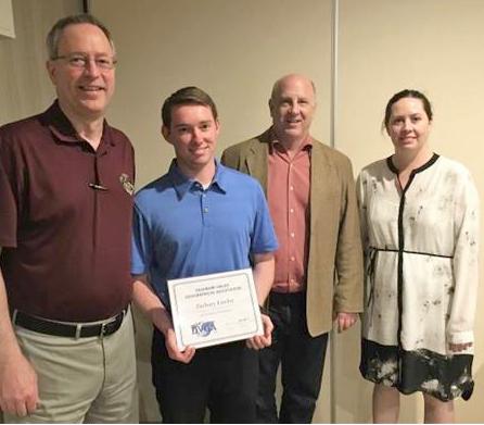 Zach Lawlor surrounded by geography department professors and holding his DVGA award 