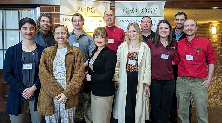 Dr. Friehauf and a faculty member with nine Kutztown University students posing for a photo at the PA  Council of Professional Geologists annual conference.