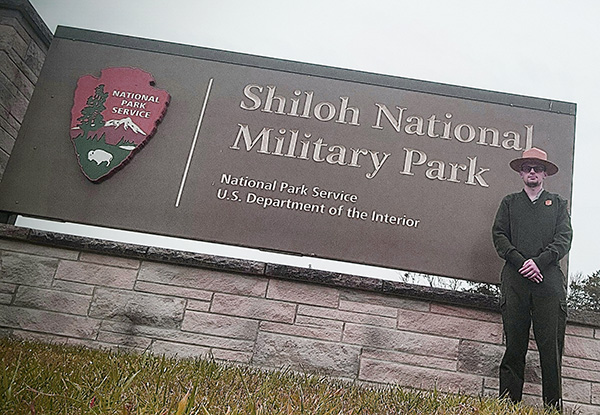 Kyle Hordyszynski in front of the Shiloh National Military Park Sign