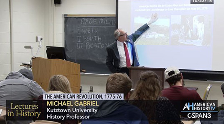 Dr. Michael Gabriel lecturing to a class on the American Revolution 