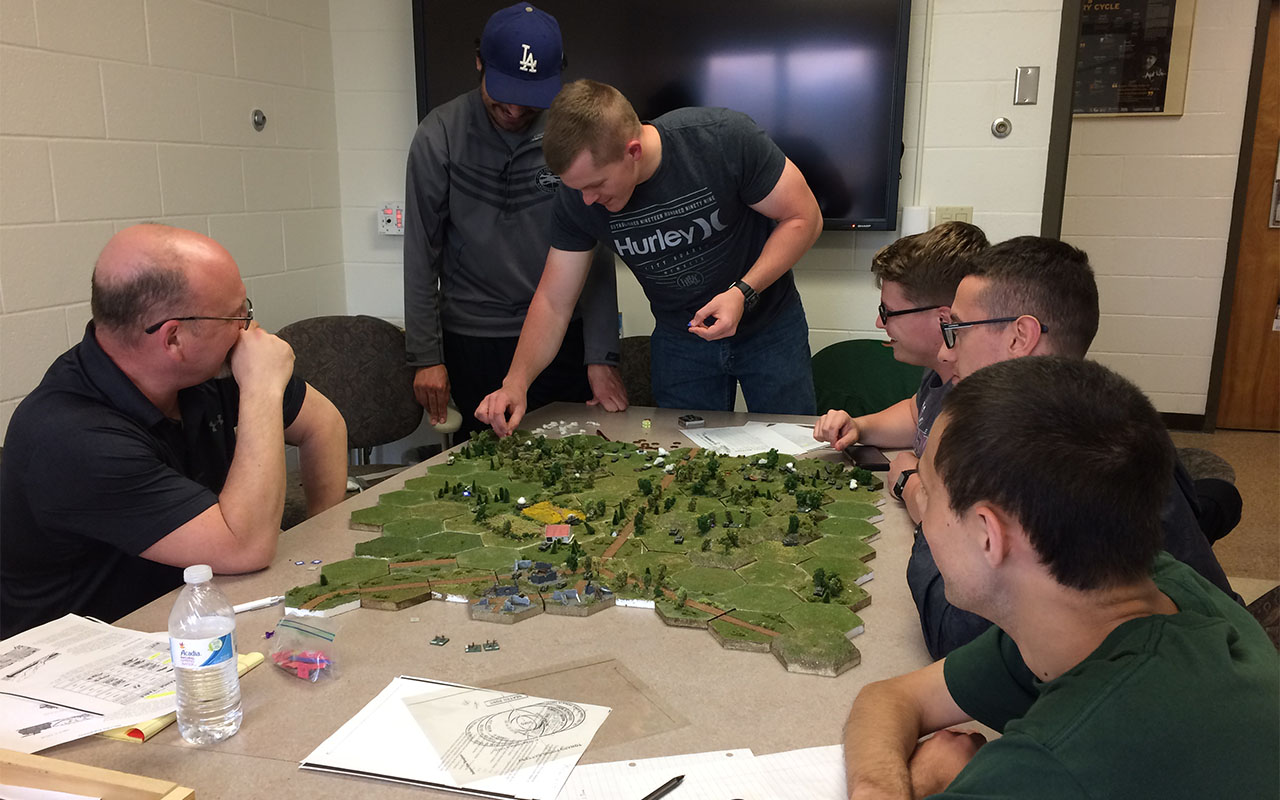 Dr. Gambone supervising extra credit war board game