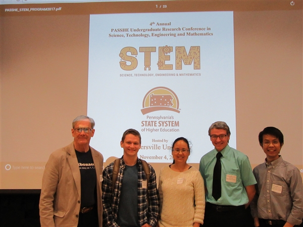 Students and faculty mentors at a conference