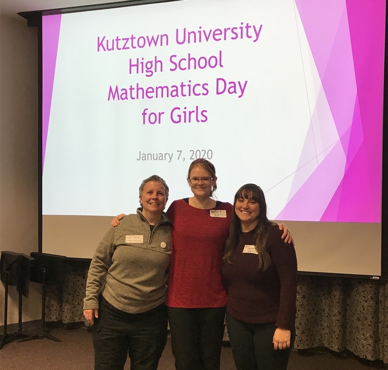 2020 presenters in front of a projector screen