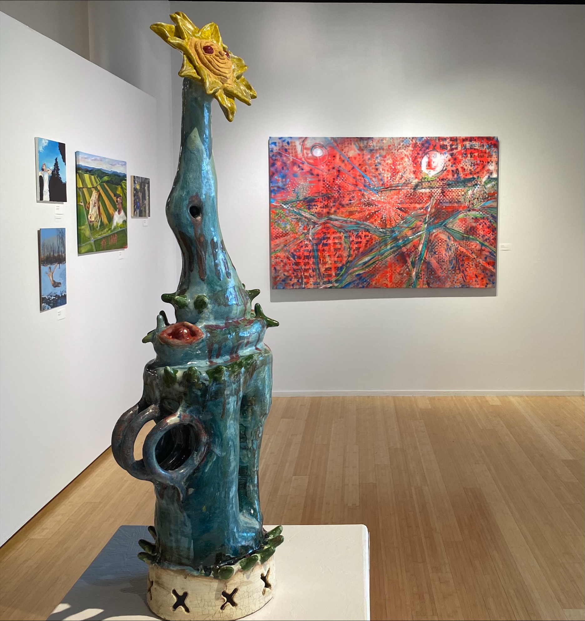 colorful abstract drawing of faces and bodies