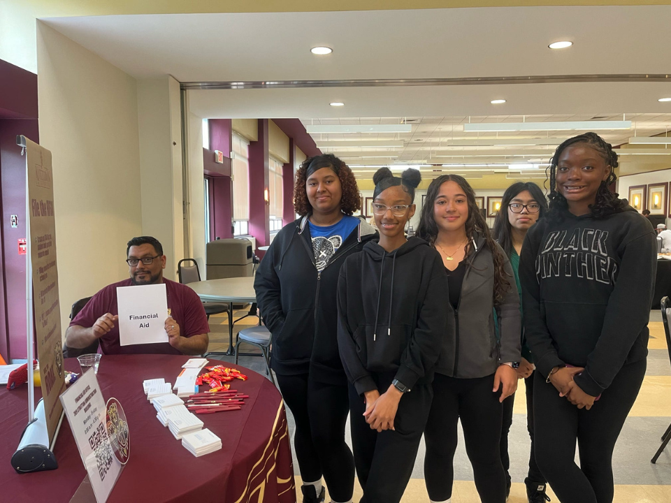 Group of GAP students pose with Financial Aid staff member.
