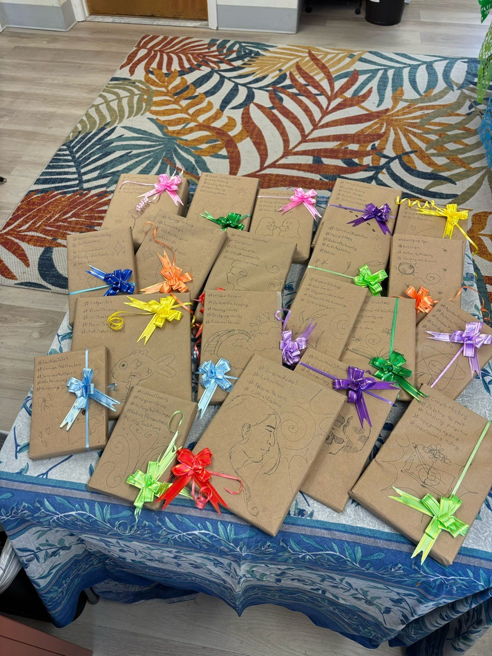 Group of wrapped books for book giveaway event.