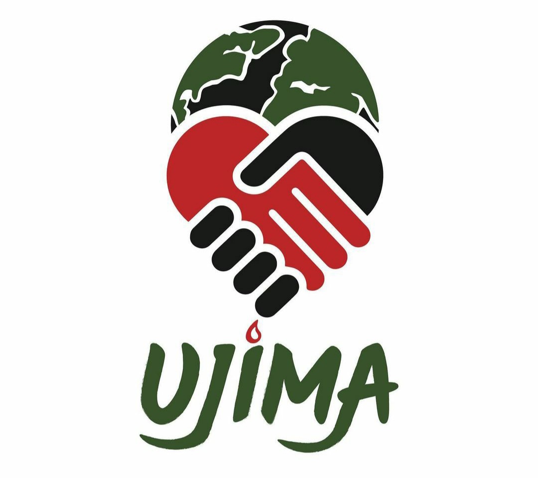 Logo for Ujima Conference - picture of a globe behind two hands held in the shape of a heart. Under this it says "Ujima" in green letters with the i dotted with a flame to look like a candle.