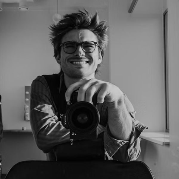 Austin Kruczek photographer photo with camera, black and white