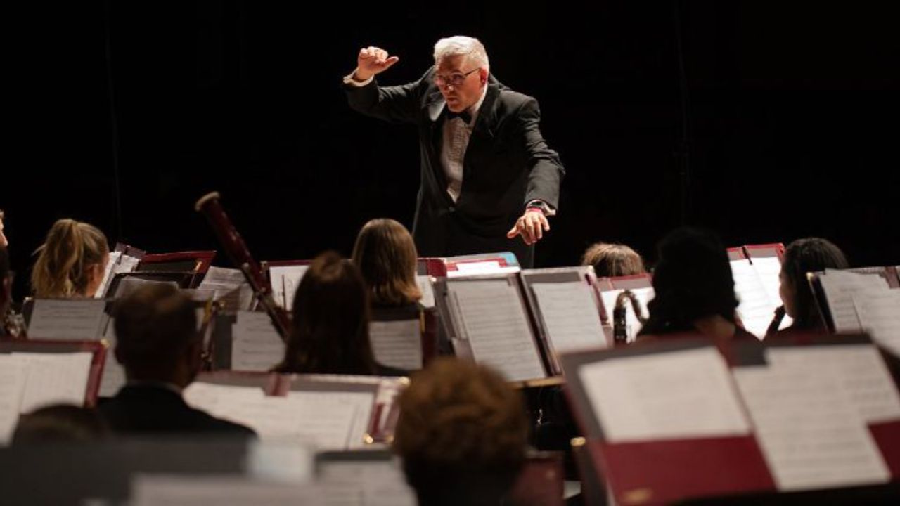 Wind ensemble in concert with director