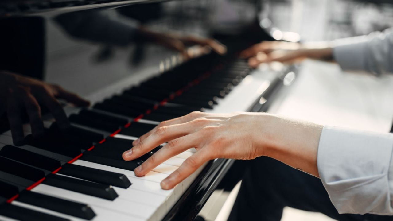 Guitar player playing their guitar