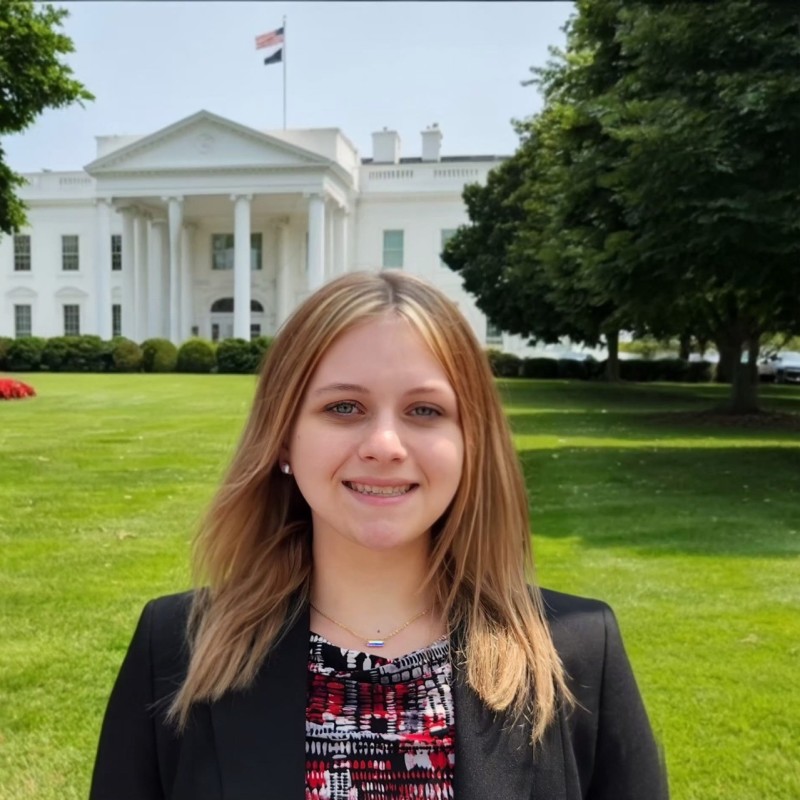 Photo of Lily Thomas on the White House lawn