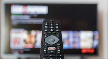 Remote being pointed at a tv