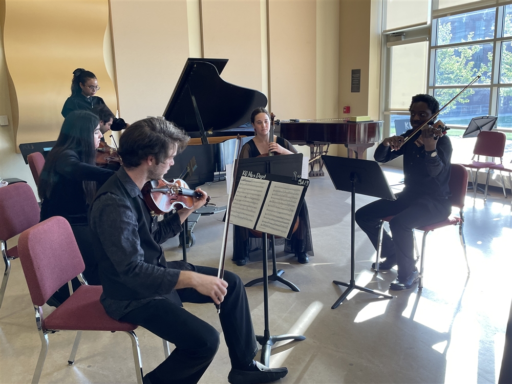 Piano quintet performs Allegro brillante for guests of the faculty mentorship awards.