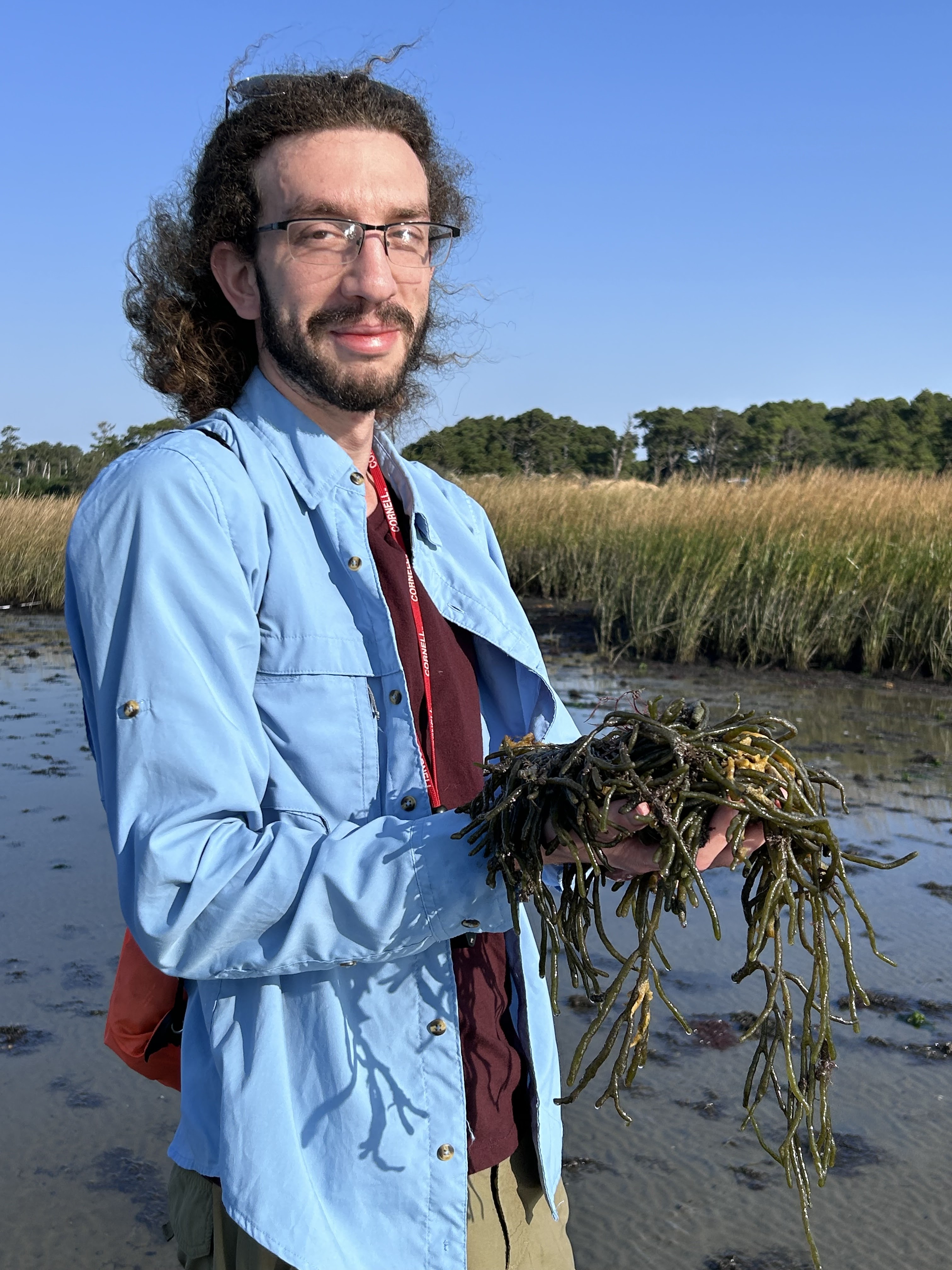 Dr. Obrien holding seaweed