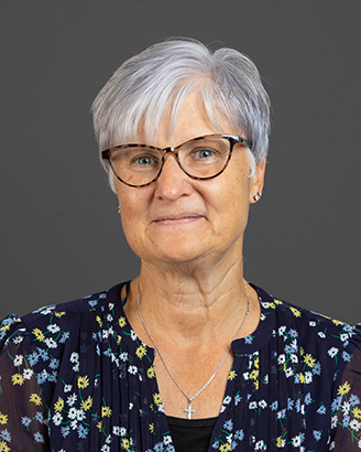 Image of Andrea Snyder against gray background