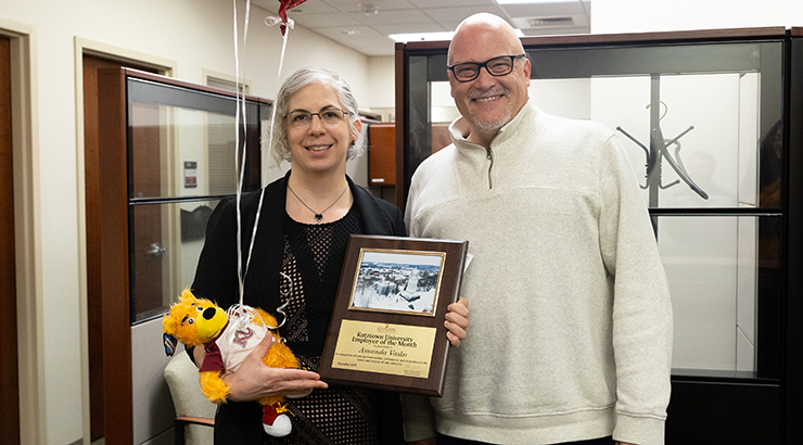 Vasko accepting awards from Cavalier