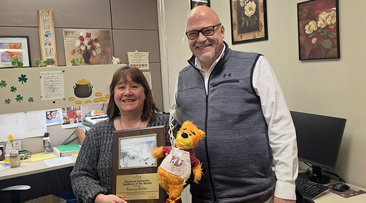 Becker accepting awards from Cavalier
