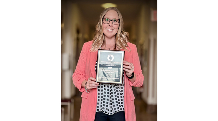 Krahwinkel-Bower holding award