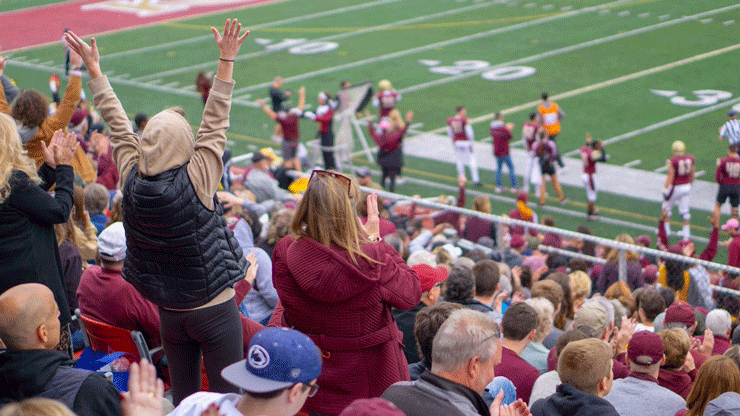 A photo of fans cheering in Andre Reed Stadium