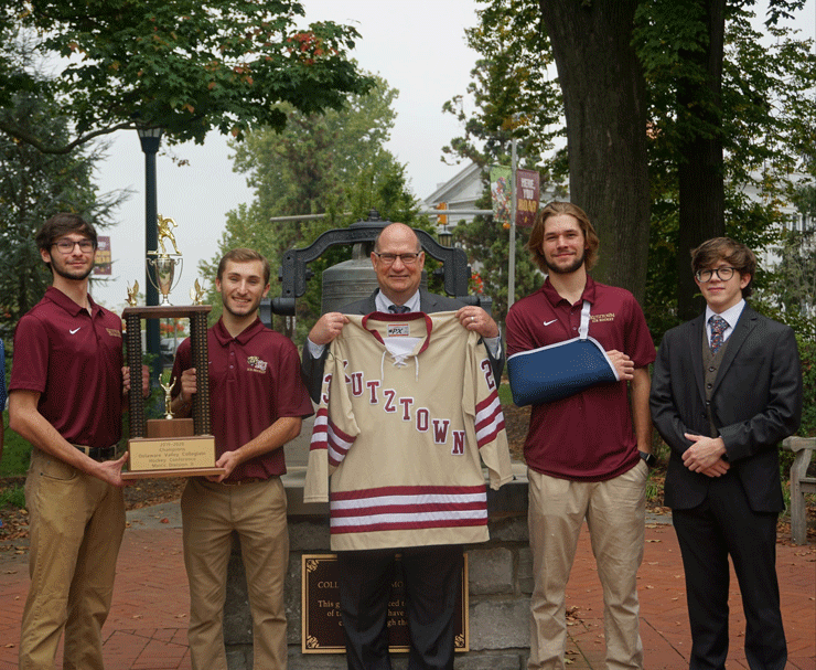 Photo left to right Michael Kovach, Joseph DeFilippis III holding trophy, President Hawkinson holding the presented jersey, Jackson Novak and Brian Lauver.