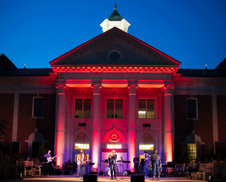 Rock Ensemble playing in front of Schaeffer Auditorium.