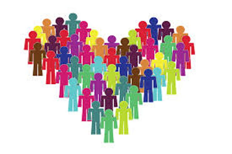 A silhouette of a human figure, replicated in various colors, stand together in shape of a heart. 