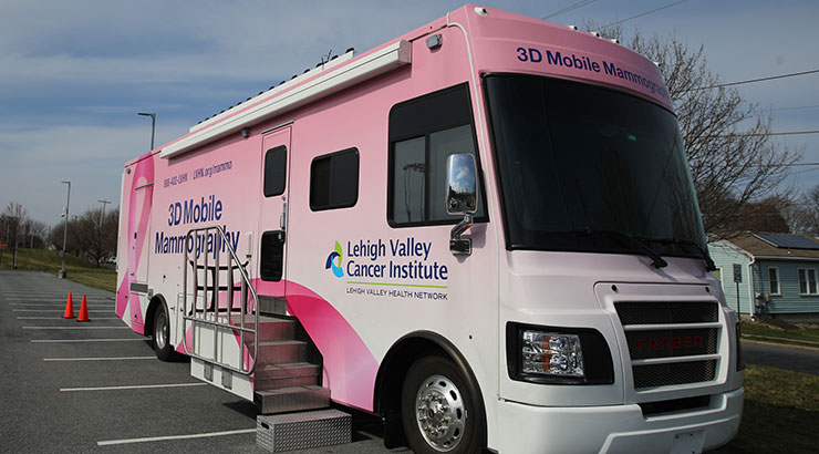 Image of the pink ribbon 3D Mobile Mammography clinic coach, sponsored by Lehigh Valley Cancer Institute. 