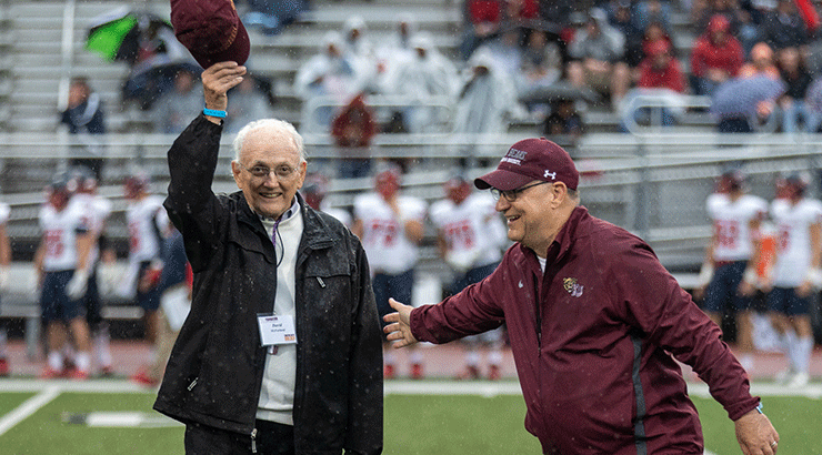 Former President David E. McFarland (left) and President Kenneth S. Hawkinson (right) at Andre Reed Stadium  Oct. 16, 2021.