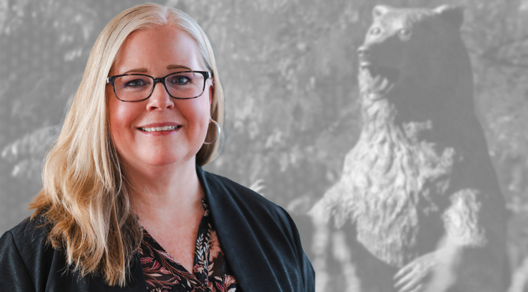 Graphic of Post-Whisted with bear statue in background