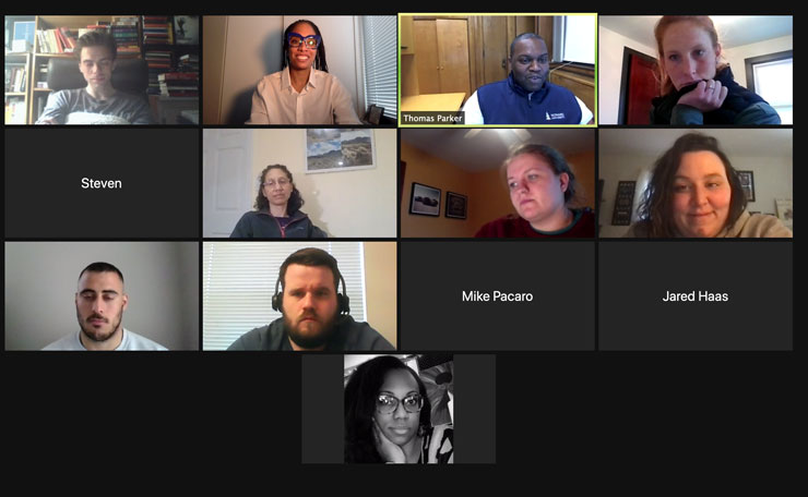 Screenshot of Zoom meeting with three rows of four people and a 13th person in the fourth row.